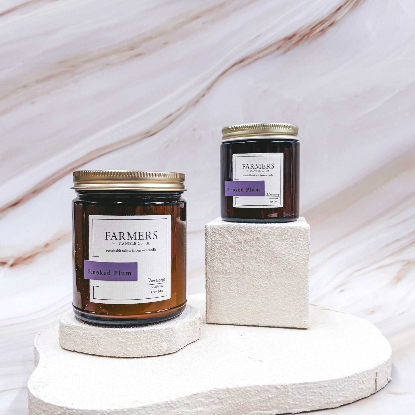 Smoked Plum fragrance with fresh green leaves, crisp pear, cinnamon, sugar, and smoky sandalwood notes
