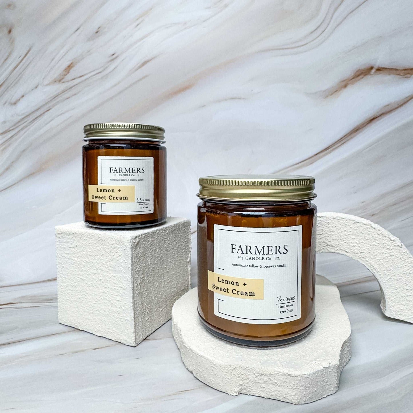Lemon + Sweet Cream fragrance with lemon, bergamot, orange, mint, cake, whipped butter, tonka bean, and honey notes