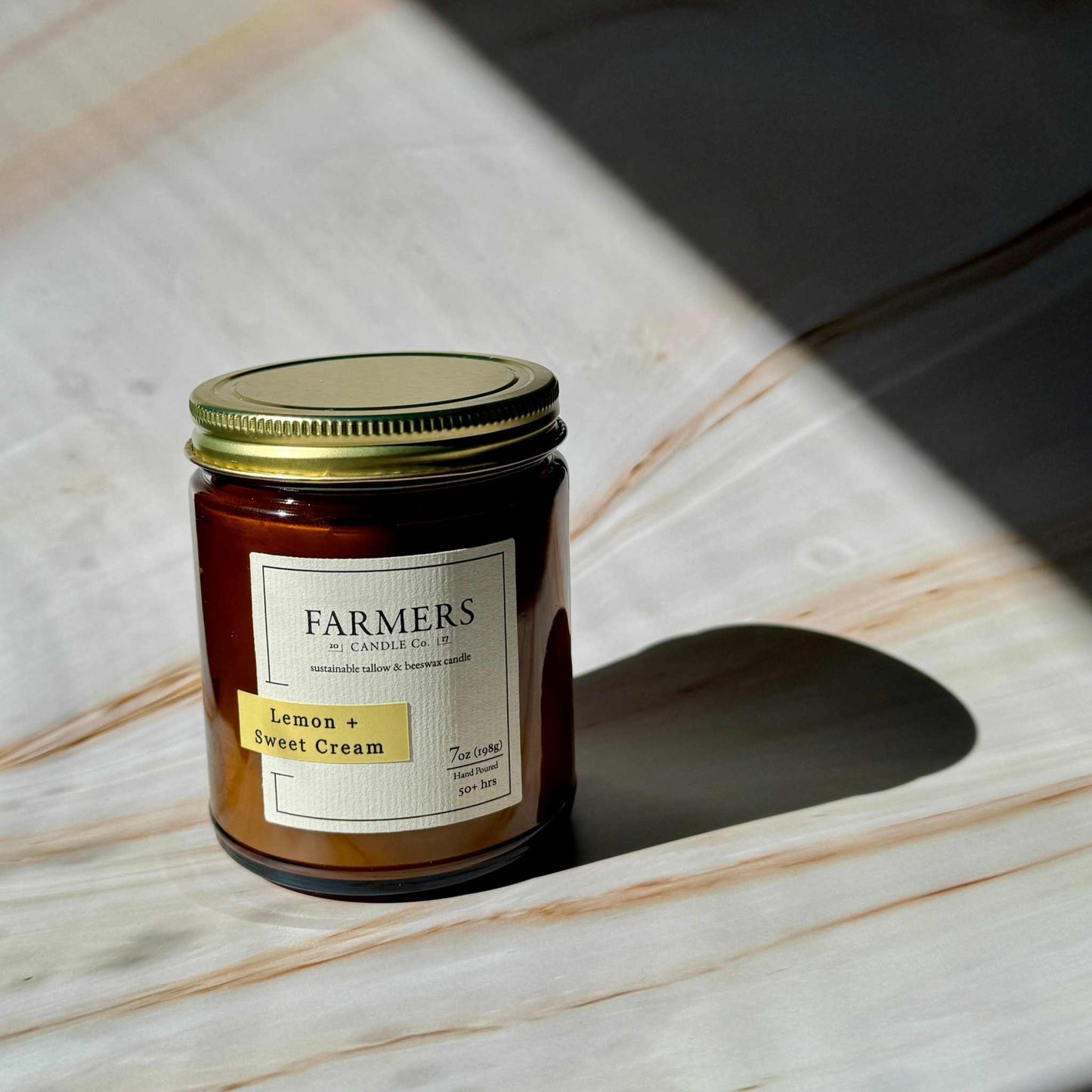 Sparkling Lemon + Sweet Cream fragrance with citrus, cake, and honey notes